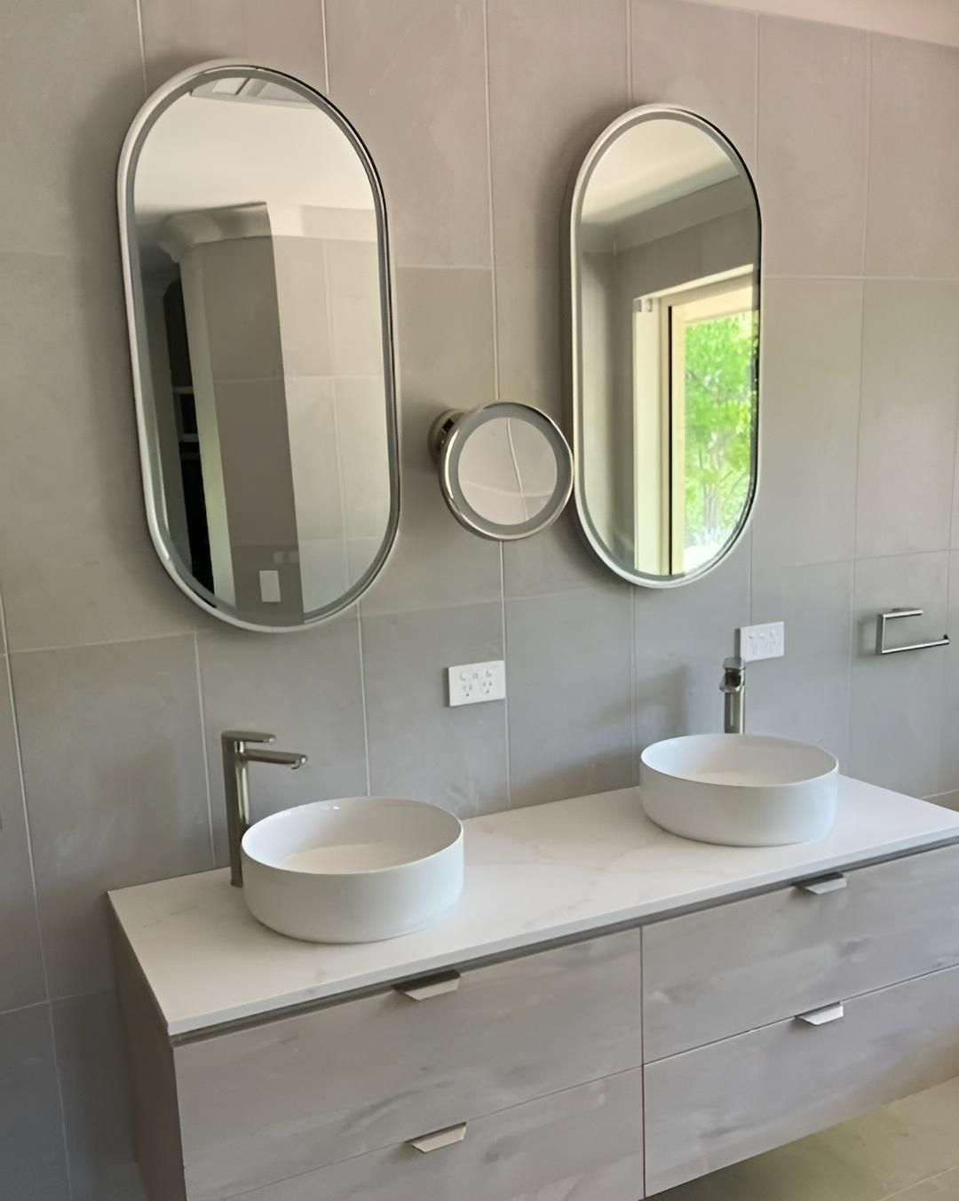 A Bathroom with Two Sinks and Two Mirrors on The Wall — Bowral Bathrooms in Exeter, NSW