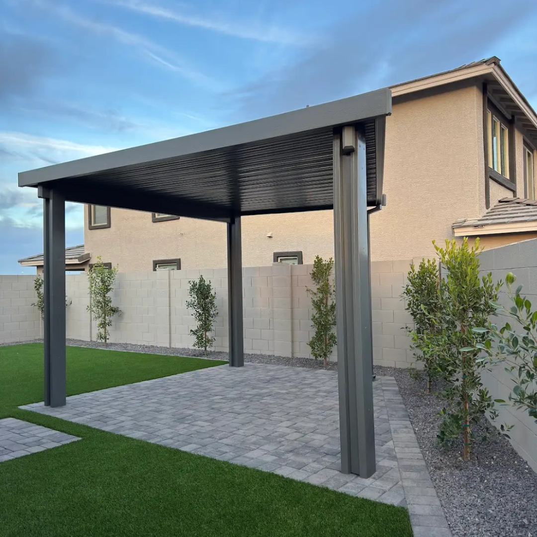 A house with a pergola in front of it
