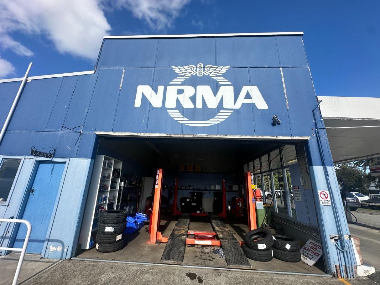 Blue Building With the Word Nrma on It — 365 Towing Taree in Oldbar, NSW