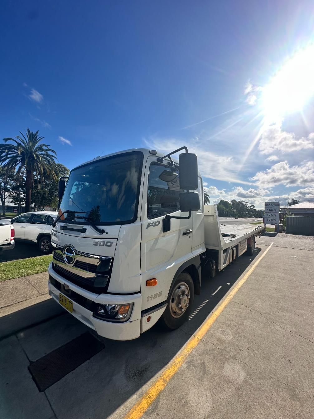 White Tow Truck is Parked in a Parking Lot — 365 Towing Taree in Taree, NSW