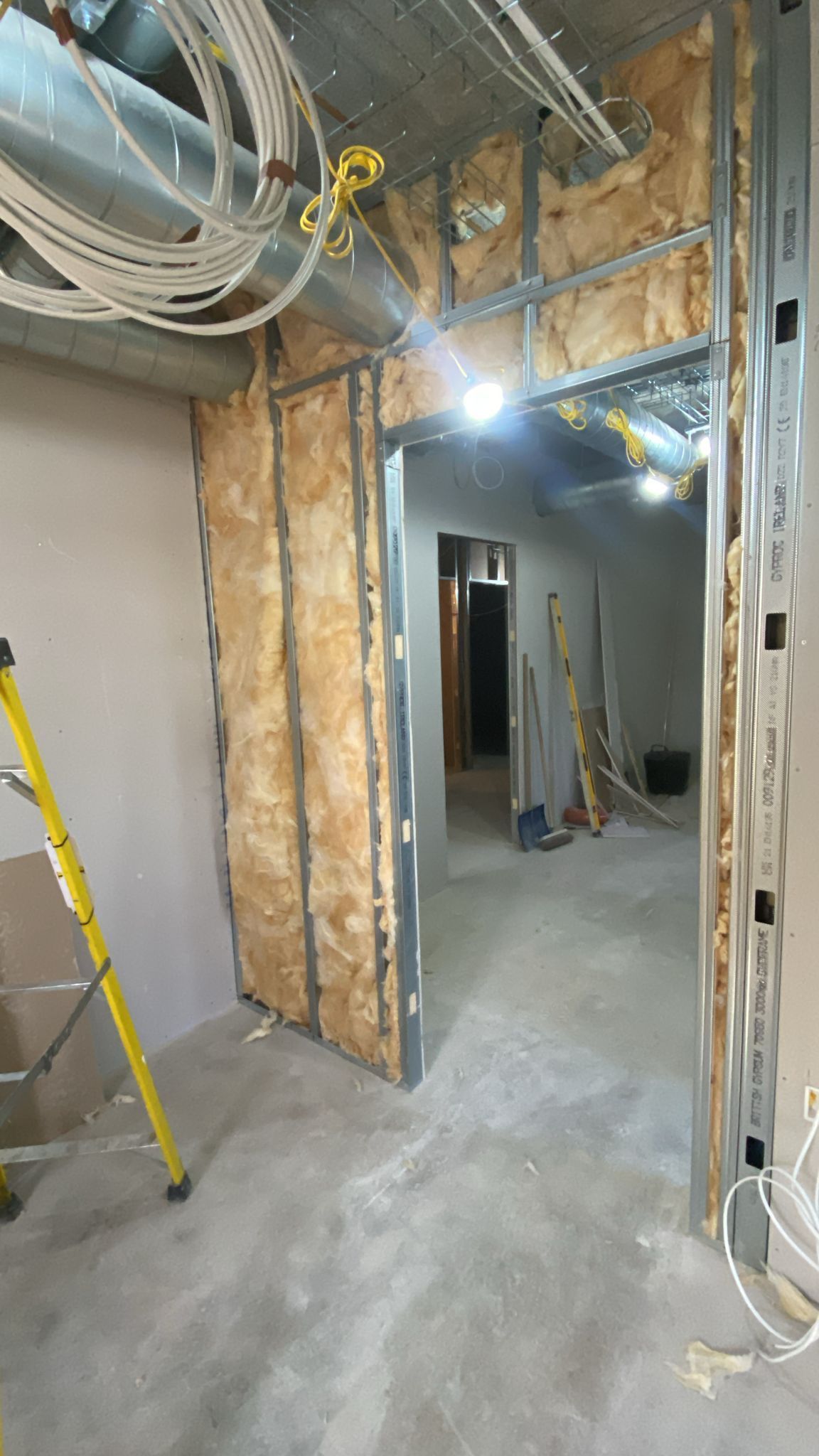 Ducting and stud wall erection