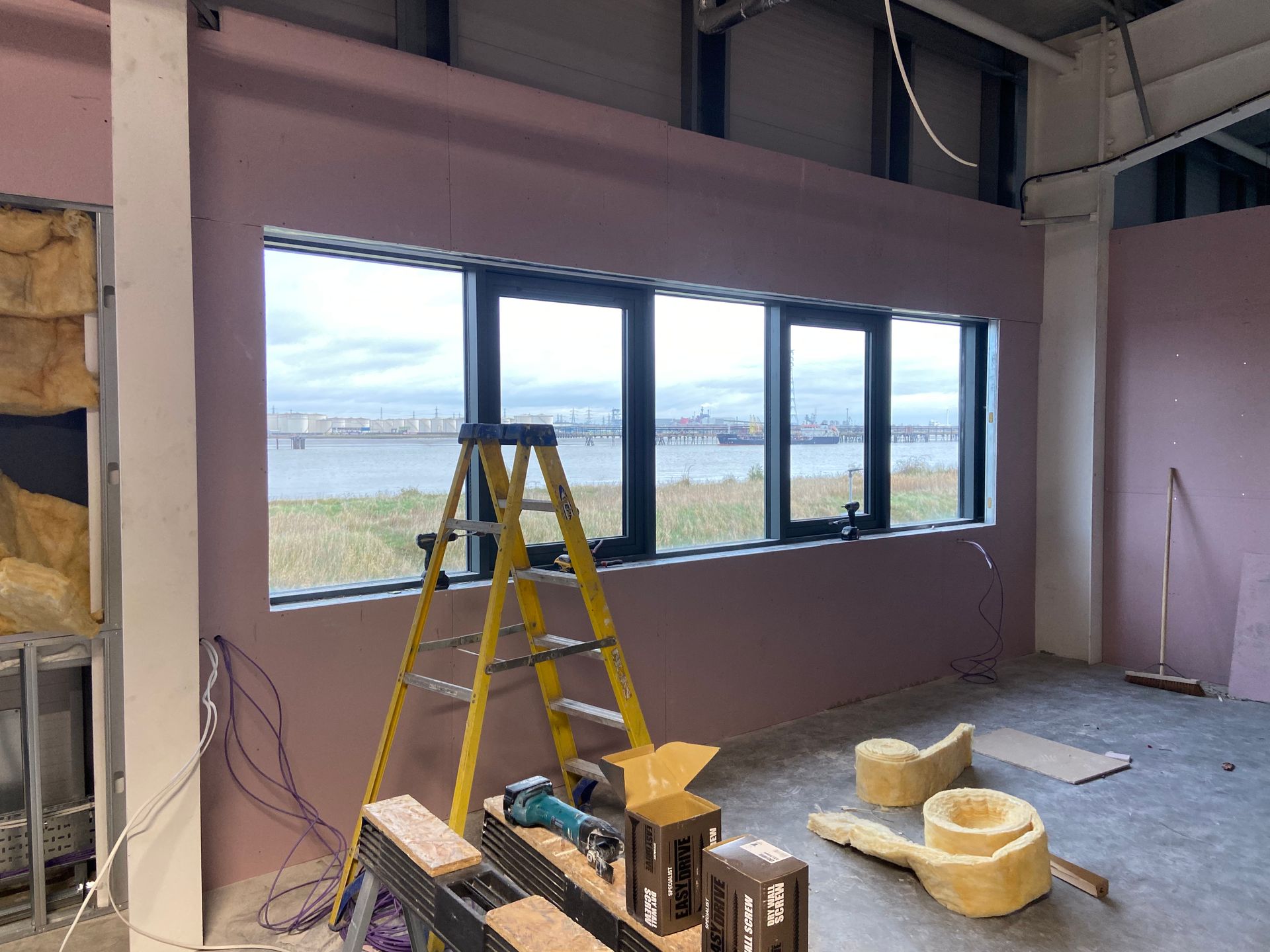 Plaster Boarding of Dwelling 