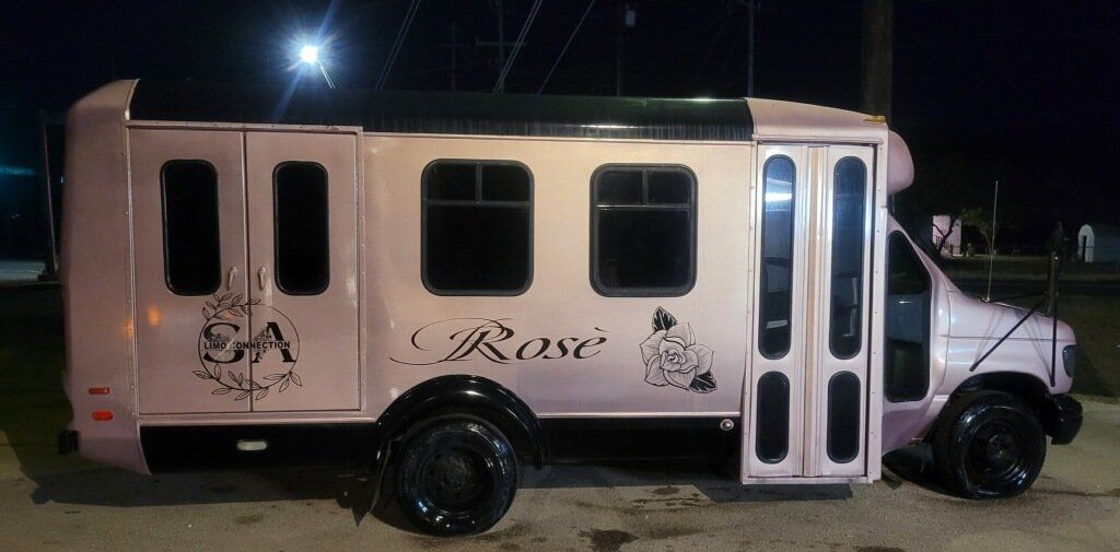 SATX party bus outside view at night for 14 passengers