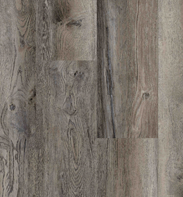Gray-brown wood plank flooring, with prominent grain and knots.