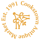 Circular orange “Cookstown” logo with “Market Est. 1991” text and a stylized tree emblem