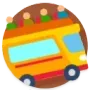 Colorful yellow and red bus with luggage on top, moving along a road