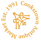 Orange circular logo reading “Est. 1991 Cookstown Antique Market” around stylized initials.
