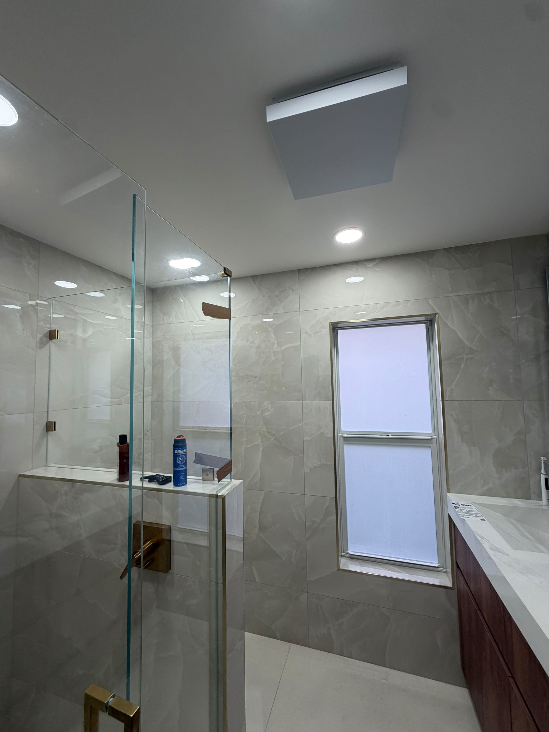 Frosted privacy window film on a residential bathroom window