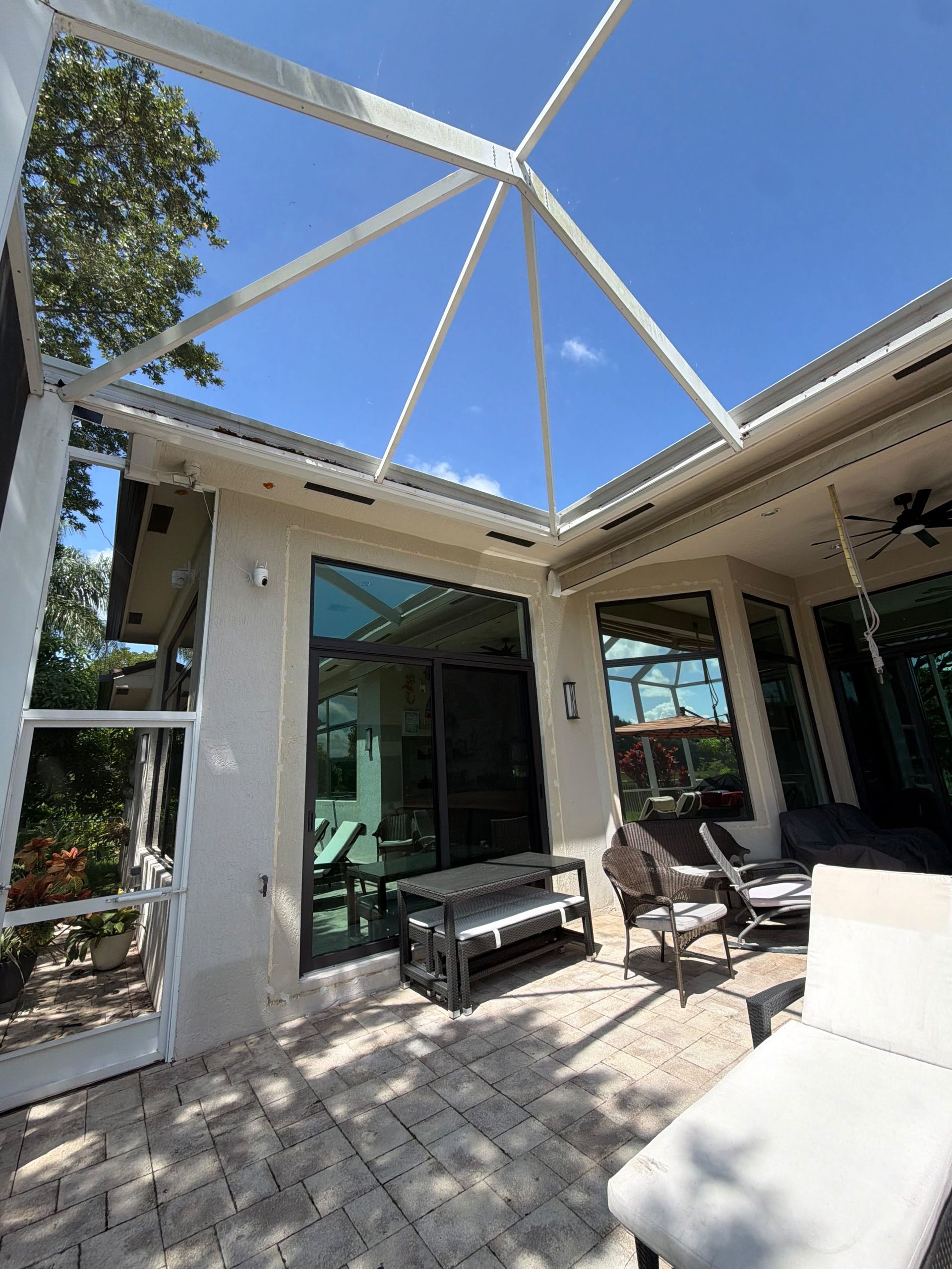 Residential window tinting on patio sliding glass doors in a South Florida home