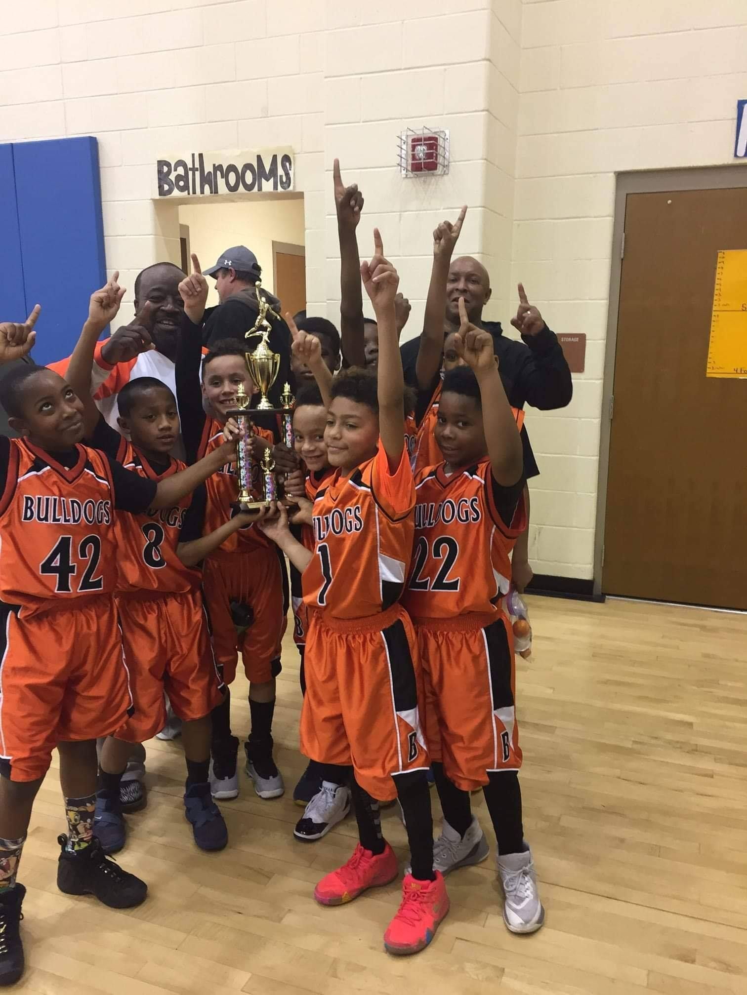 children celebrating after winning the game