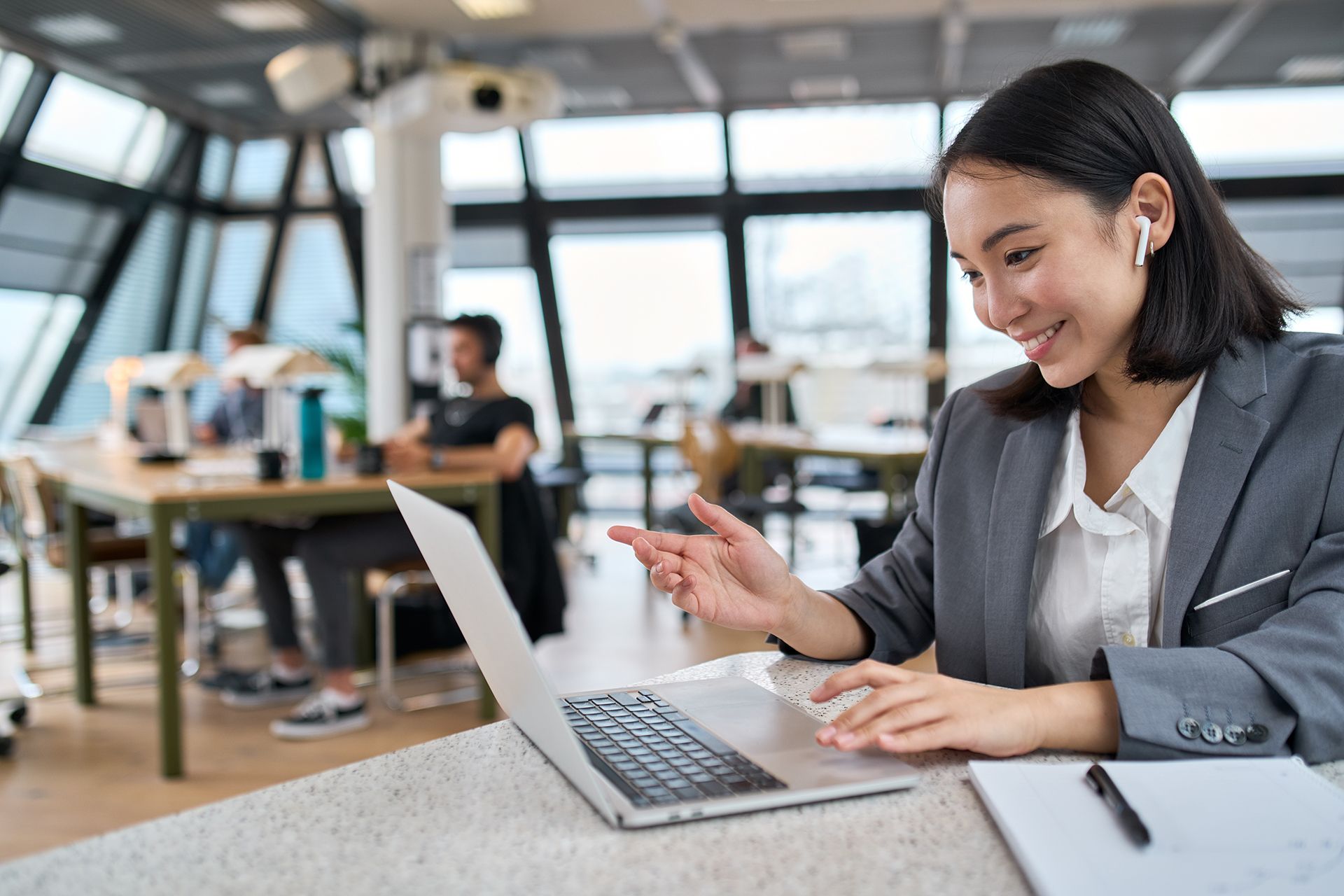 Financial Advisor Talking Someone on Her Laptop