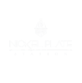 White logo for Nickel Plate Station featuring an icon of a train engine over the stylized text.