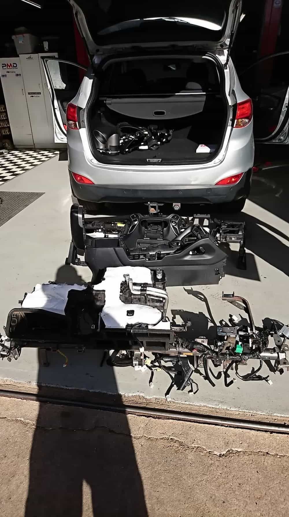 The Trunk Of A Car Is Open And Filled With Parts — KC Auto Electrics In Ciccone, NT