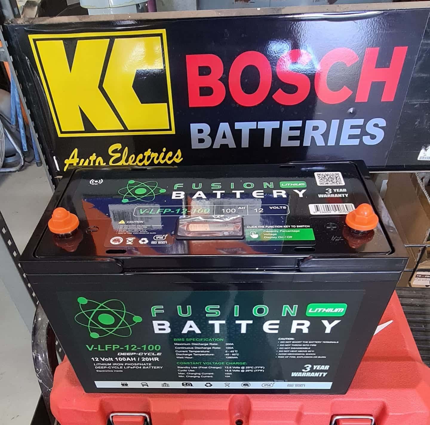 A Bosch Battery Is Sitting On Top Of A Red Box — KC Auto Electrics In Ciccone, NT