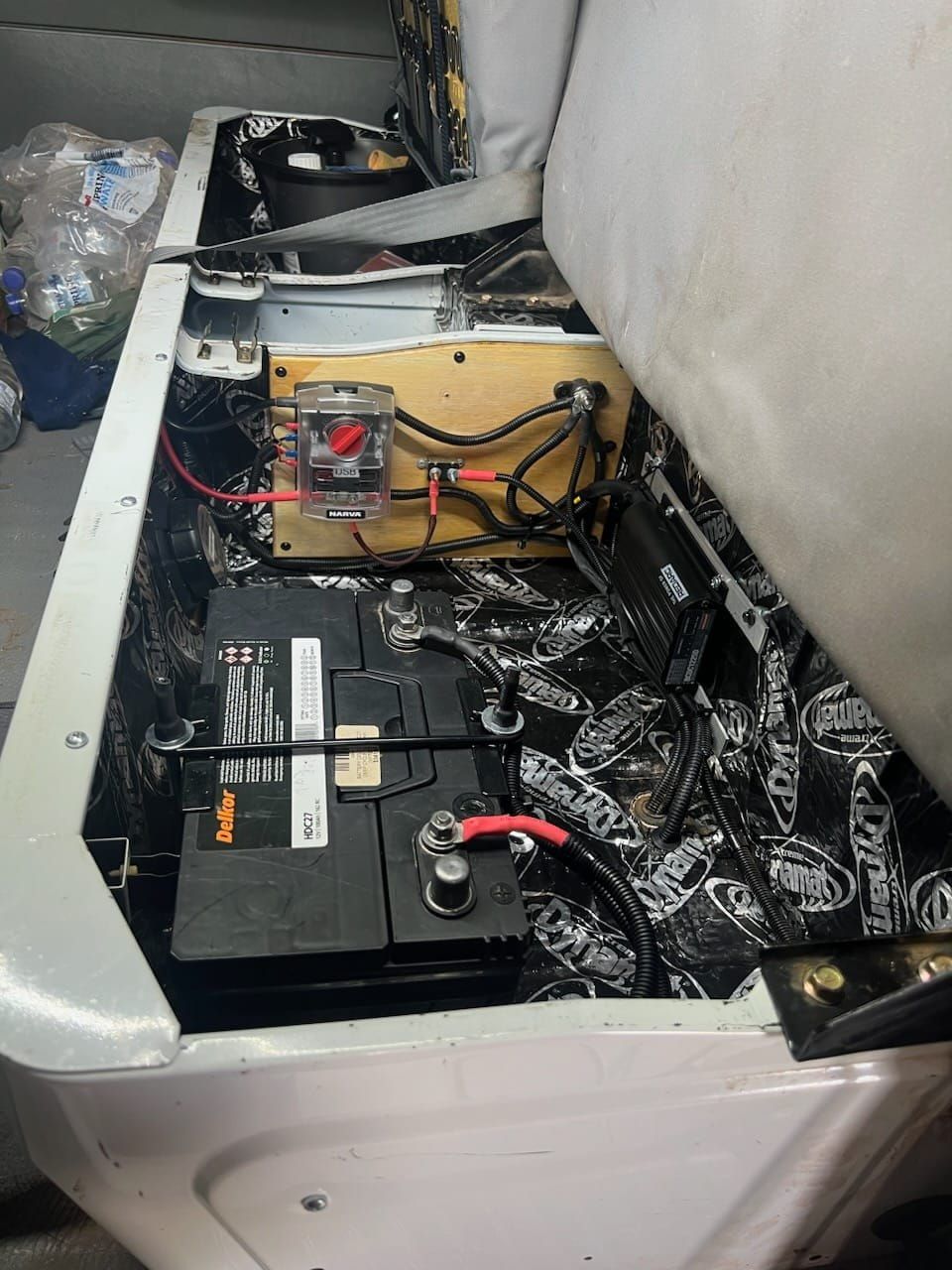 Two Batteries Are Sitting In The Back Of A Vehicle — KC Auto Electrics In Ciccone, NT