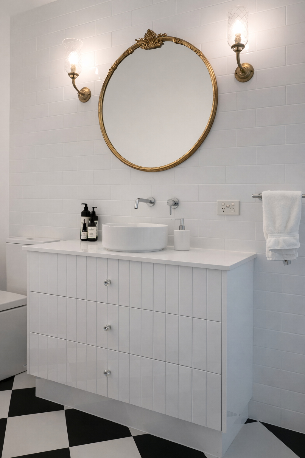 Bathroom with Two Mirrors, Sinks, and Black Countertop on White Cabinetry. Black and White Tiled Floor — Paul Tagget Kitchens In Casino, NSW