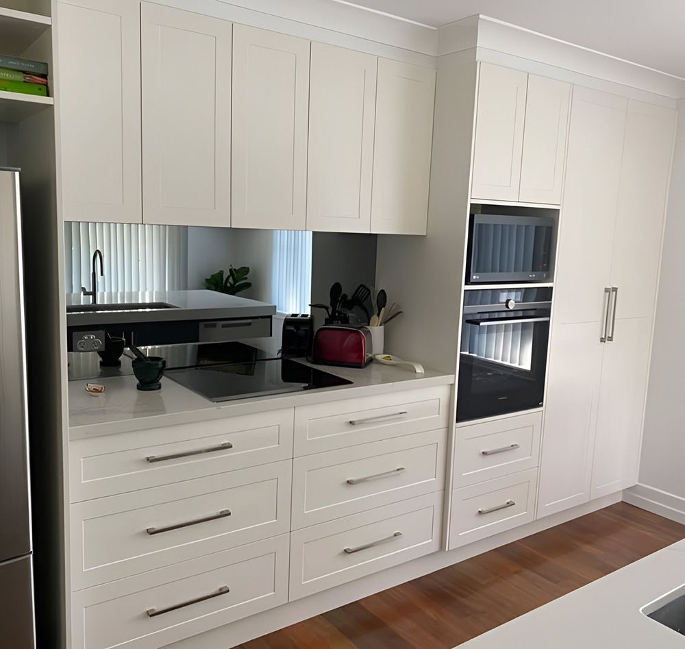 Custom White Kitchen Cabinets — Paul Tagget Kitchens In Byron Bay, NSW