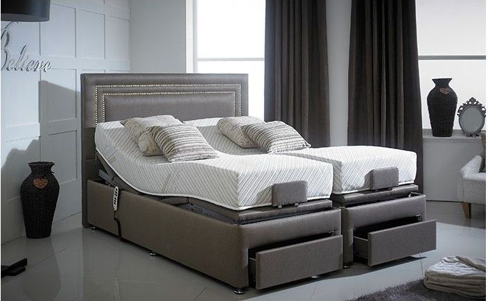 Double adjustable bed with drawer.