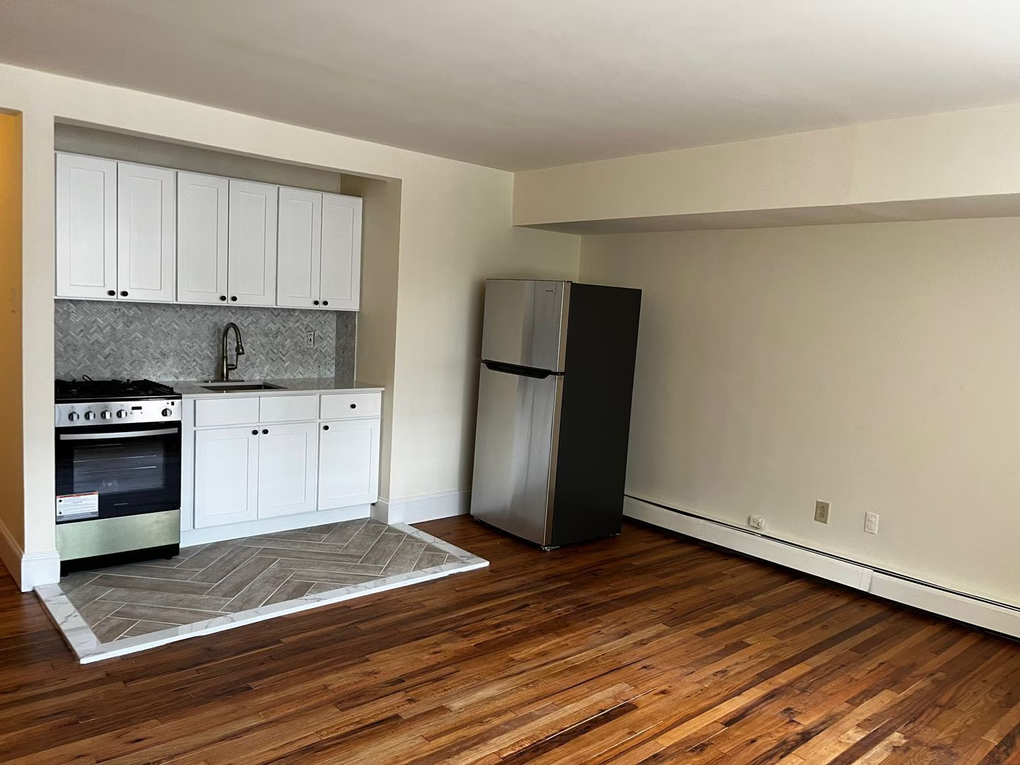 Renovated kitchen with stainless steel appliances at 22 Cottage Street South Orange NJ
