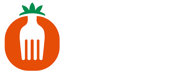Growing Hope A tomato with a fork in the middle of it.