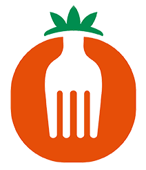 Growing Hope A tomato with a fork in the middle of it.