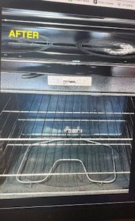 Clean oven interior after cleaning, with racks and heating element visible.