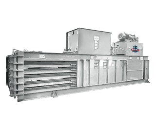 A long, industrial-grade horizontal recycling baler made of gray metal, shown against a white background.