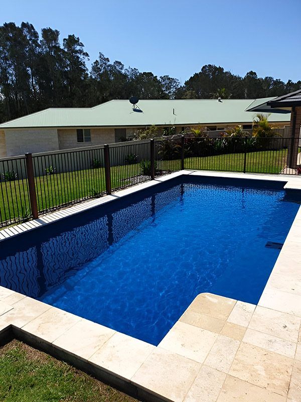  A Swimming Pool With A Fence Around It — Pool Zone in Port Macquarie, NSW