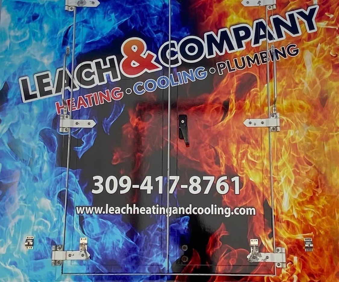 A truck that says ' leak & company heating cooling plumbing ' on it