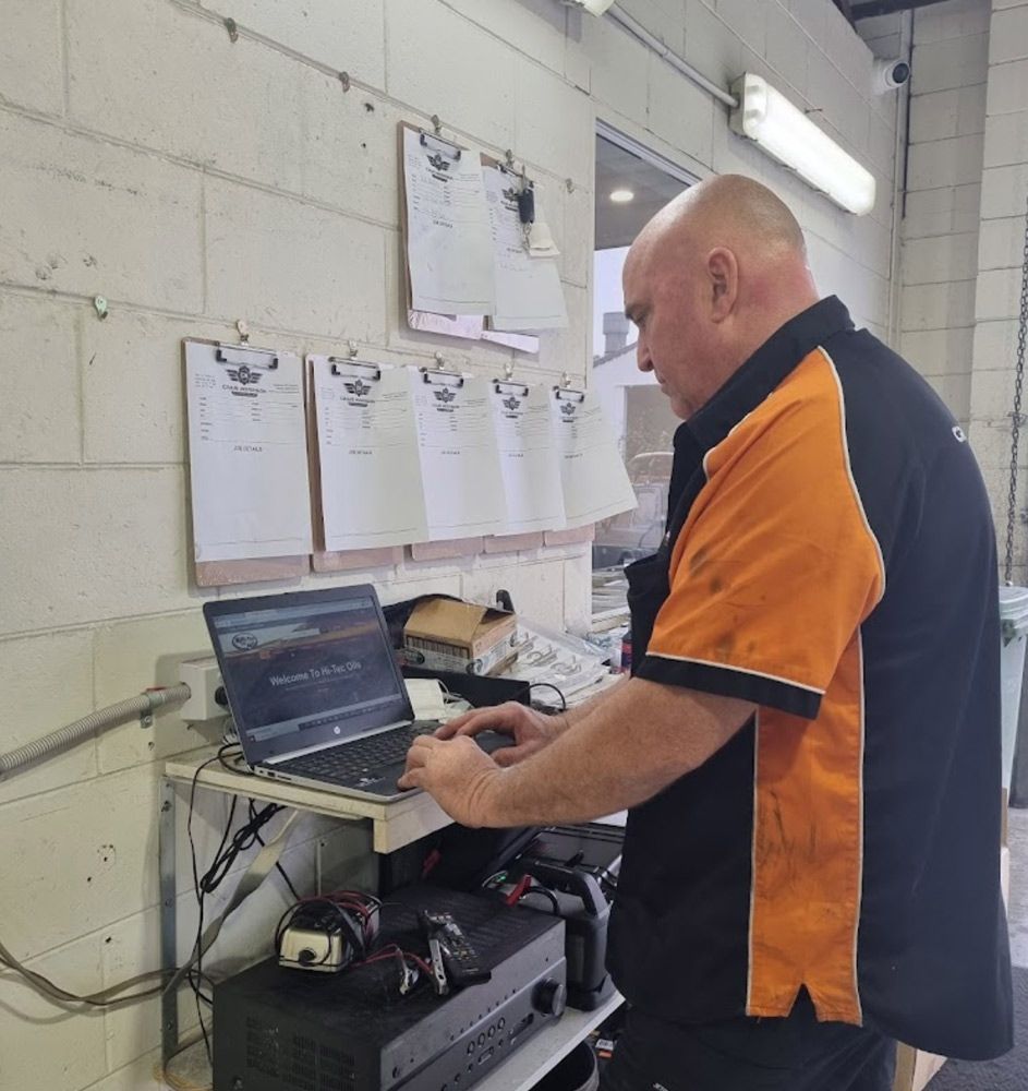 Man With Laptop — Mechanic In Noosaville, QLD