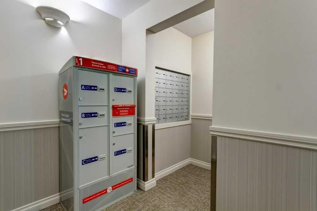 Floor plan of a Calgary home with three bedrooms, central living area, kitchen, and bathrooms.