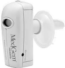 White portable nebulizer with mouthpiece attached; the brand name is MedGem.