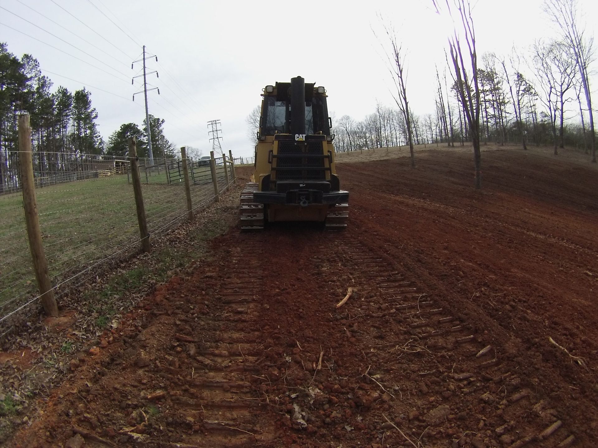 Heavy equipment grading steep mountain terrain in Gilmer County, Georgia
