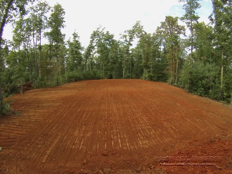 Large metal barn on a freshly graded rural pad in North Georgia