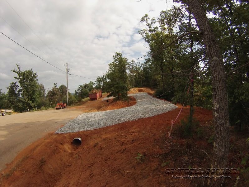 Caterpillar track loader grading a large residential lot in North Georgia