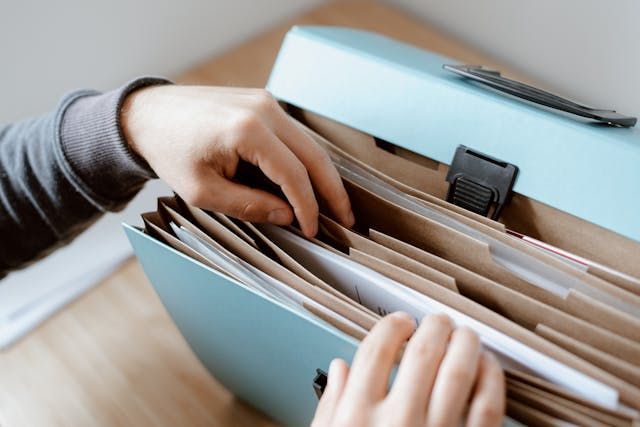 Person organizing documents