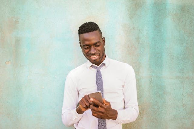 person+scrolling+on+their+cell+phone