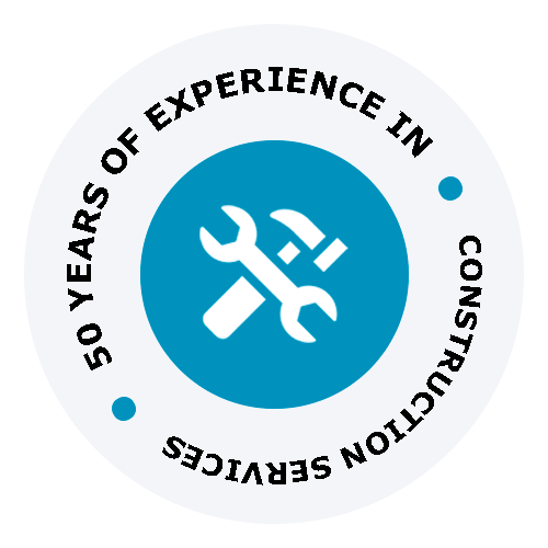 Circular logo with wrench and screwdriver, reading “50 years of experience in construction services”