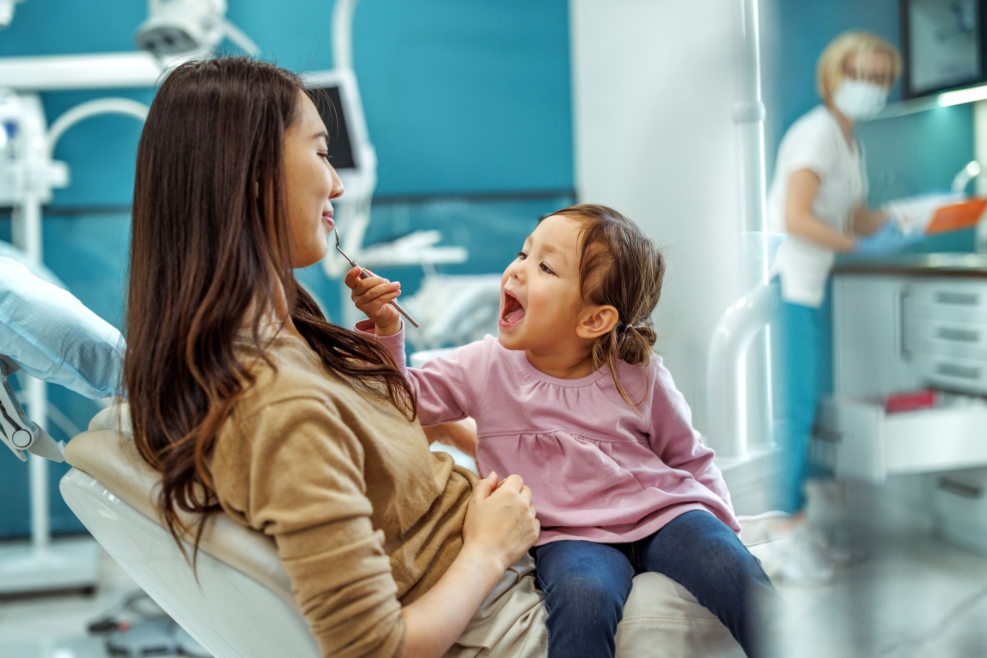 Mother And Child At Dental Clinic