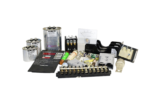 A bunch of electronic components are sitting on top of each other on a white surface.