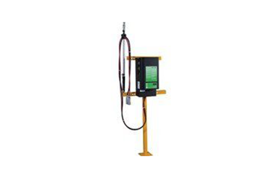 A hose is hanging from a pole next to a box on a white background.
