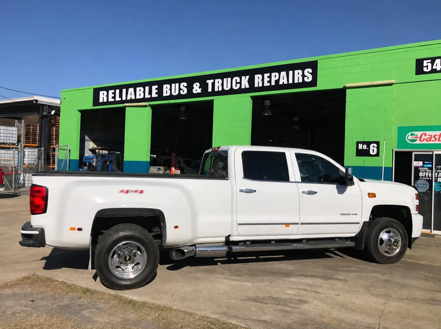 A Truck is Parked in Front of a Car and Truck Repair Shop — Reliable Bus and Truck Repairs In Caloundra West, QLD