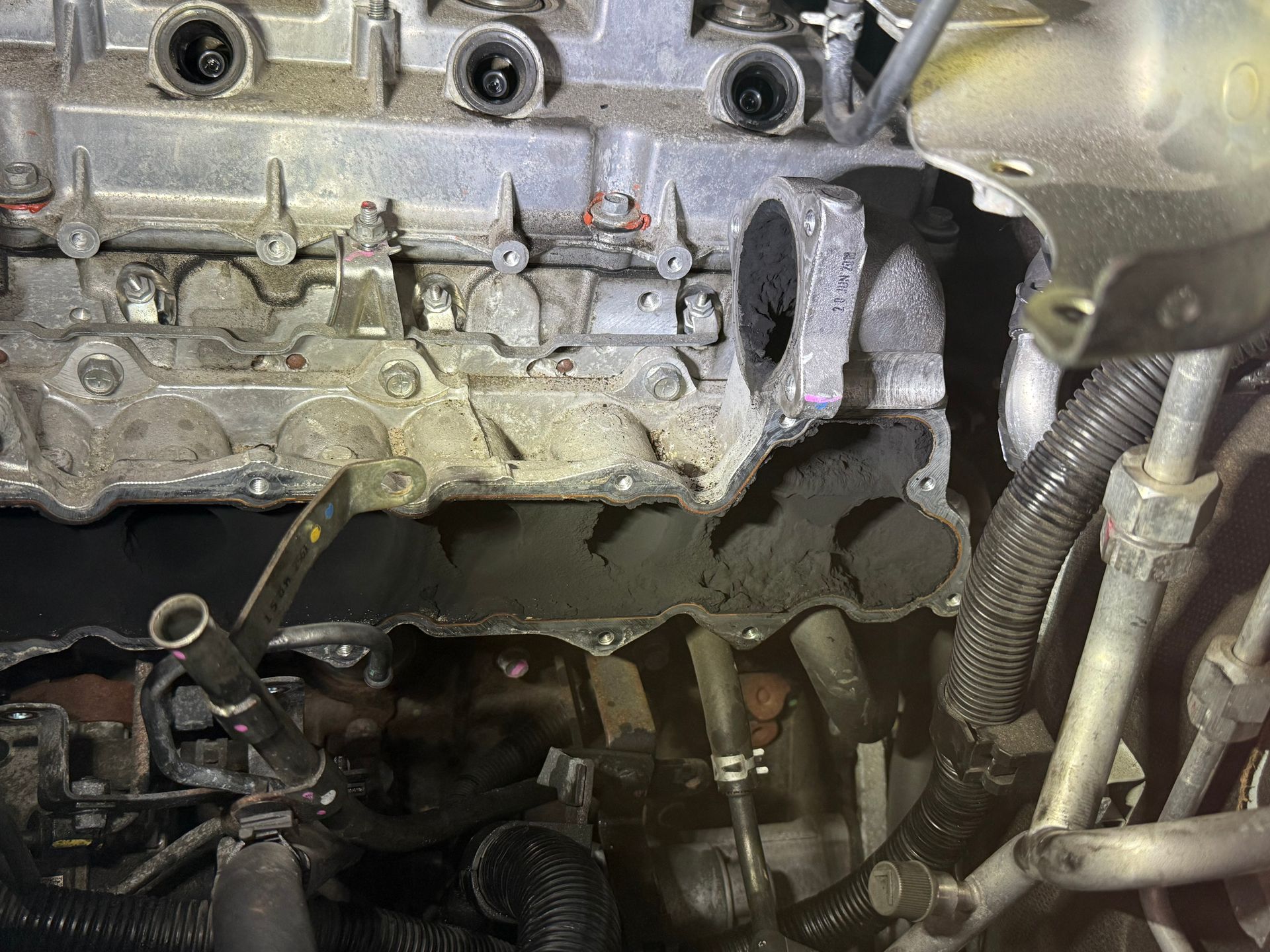 Close-up of a Car Engine Bay With Exposed Metal Components — Reliable Bus and Truck Repairs In Caloundra West, QLD
