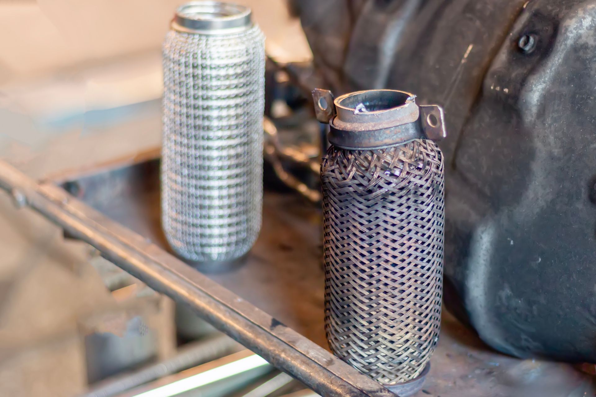 DPF Pipes Where One is New and Shiny the Other Old and Rusted — Reliable Bus and Truck Repairs In Caloundra West, QLD