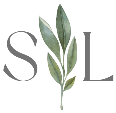 The letters s and l are surrounded by green leaves.