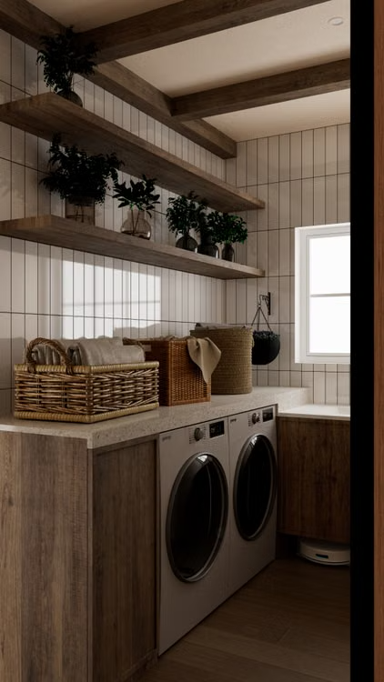 Laundry room with wood shelves, hanging plants, wicker baskets, and a washer-dryer under a window.