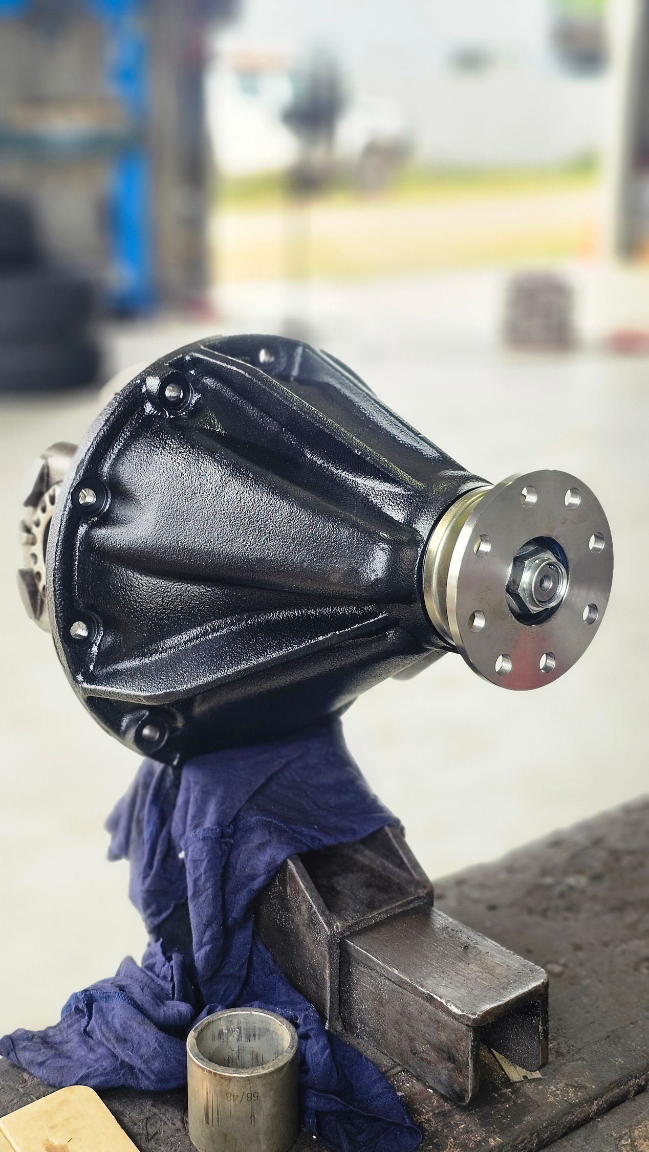 Black Painted Car Differential Clamped in a Vice on a Workbench — Track N Back 4x4 In Mareeba, QLD