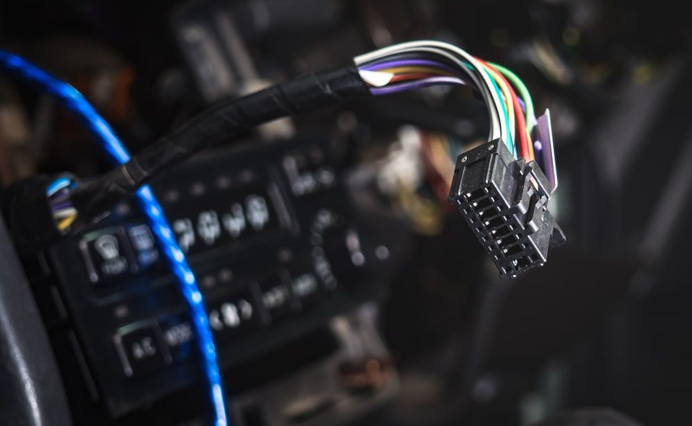 Car Radio Wiring Harness With Multicolored Wires and Black Connector — Track N Back 4x4 In Port Douglas, QLD