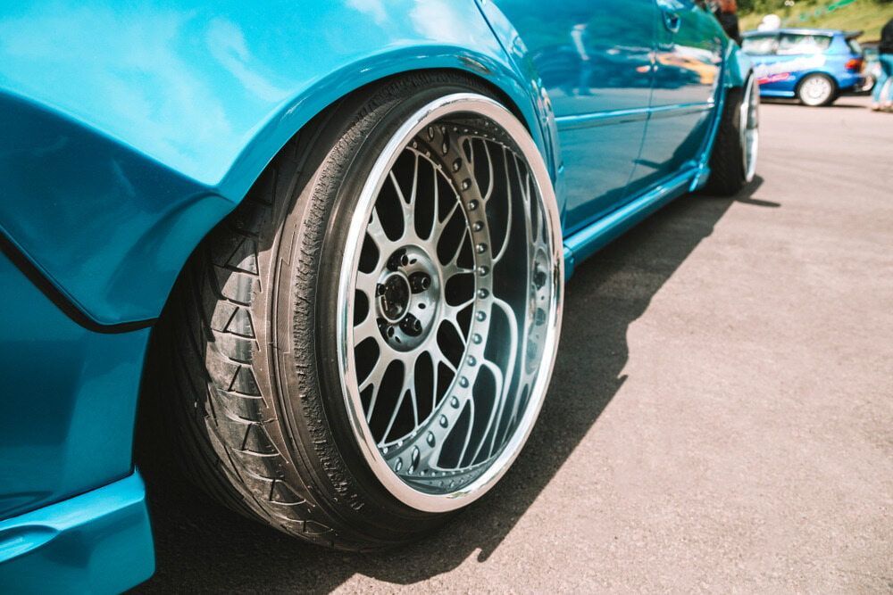 Blue Car With Chrome Wheels, Lowered Stance, on Pavement — Track N Back 4x4 In Port Douglas, QLD