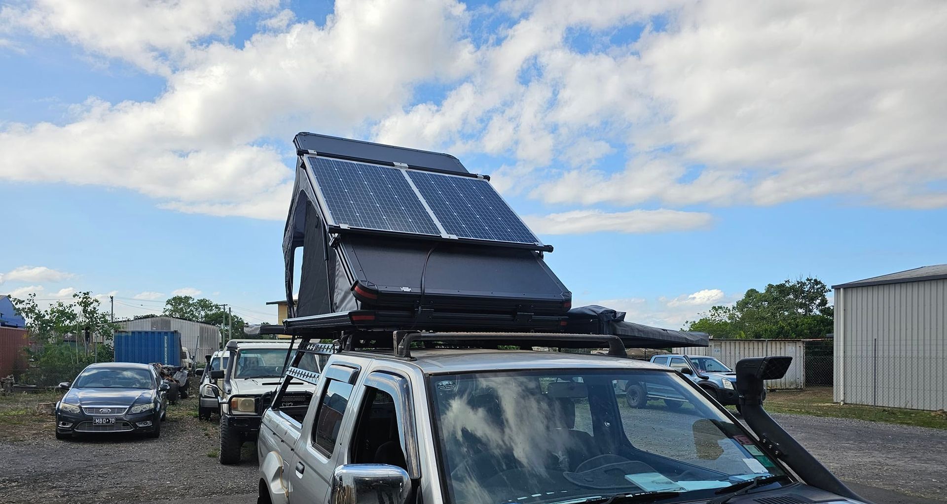 White 4x4 Truck With a Snorkel, Roof Rack, and Bull Bar — Track N Back 4x4 In Mareeba, QLD